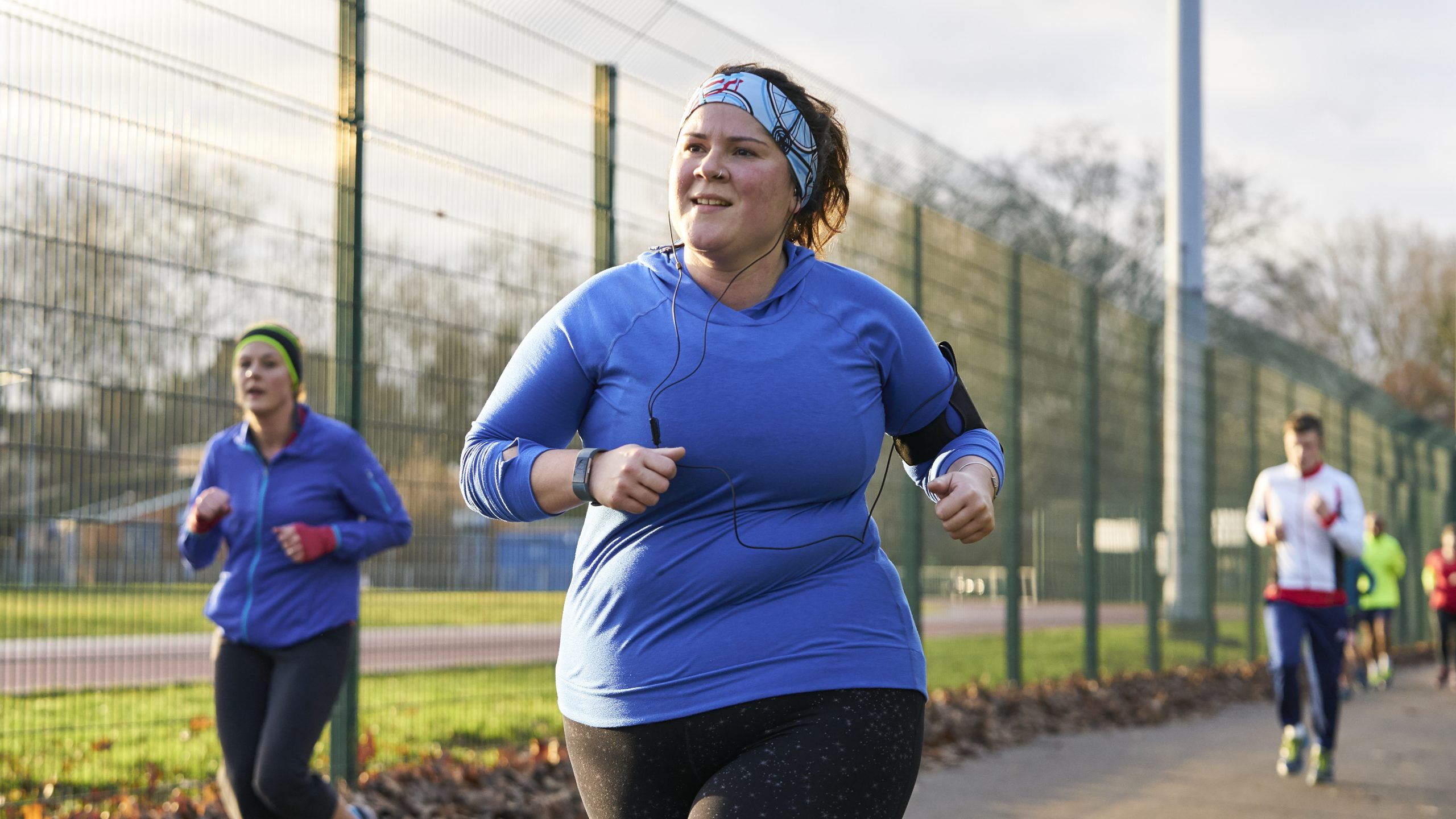 White woman aged 30-40 running