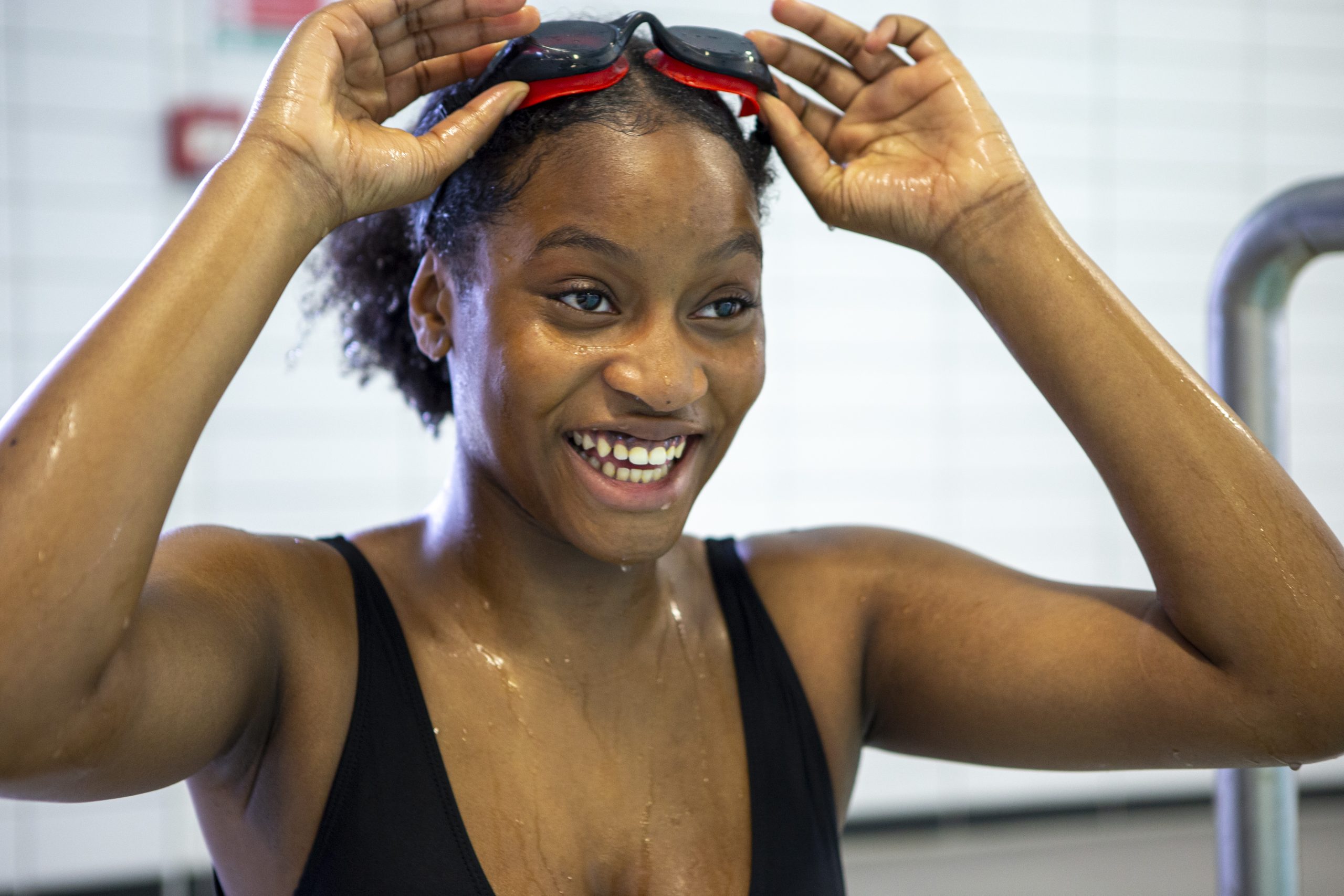A black teenage girl swimming