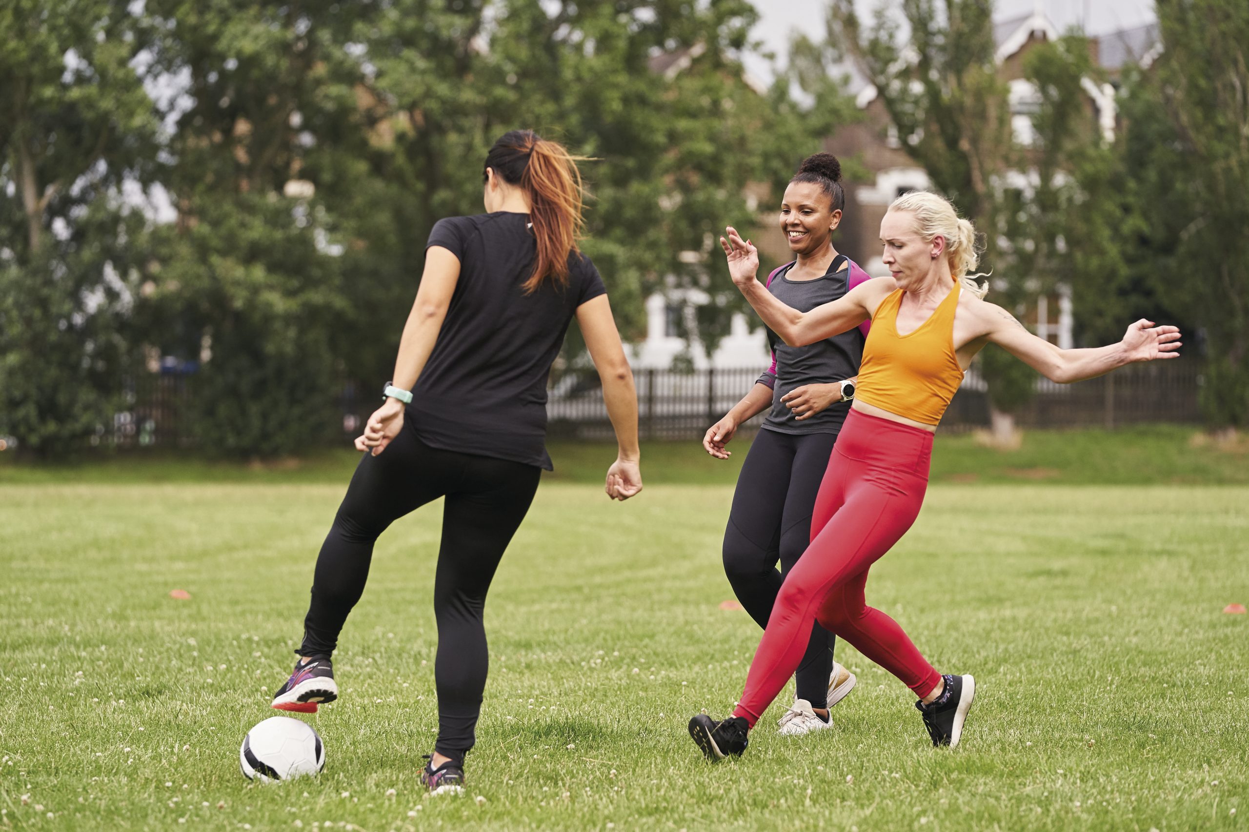 A group of women aged 34-55 playing football