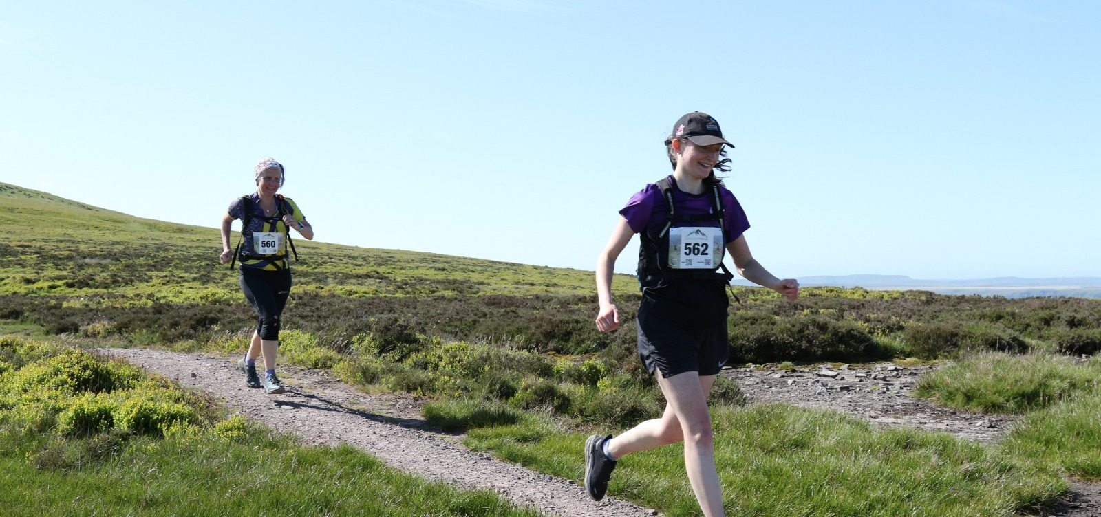Sarah and her mum running a half marathon to raise money for Women in Sport
