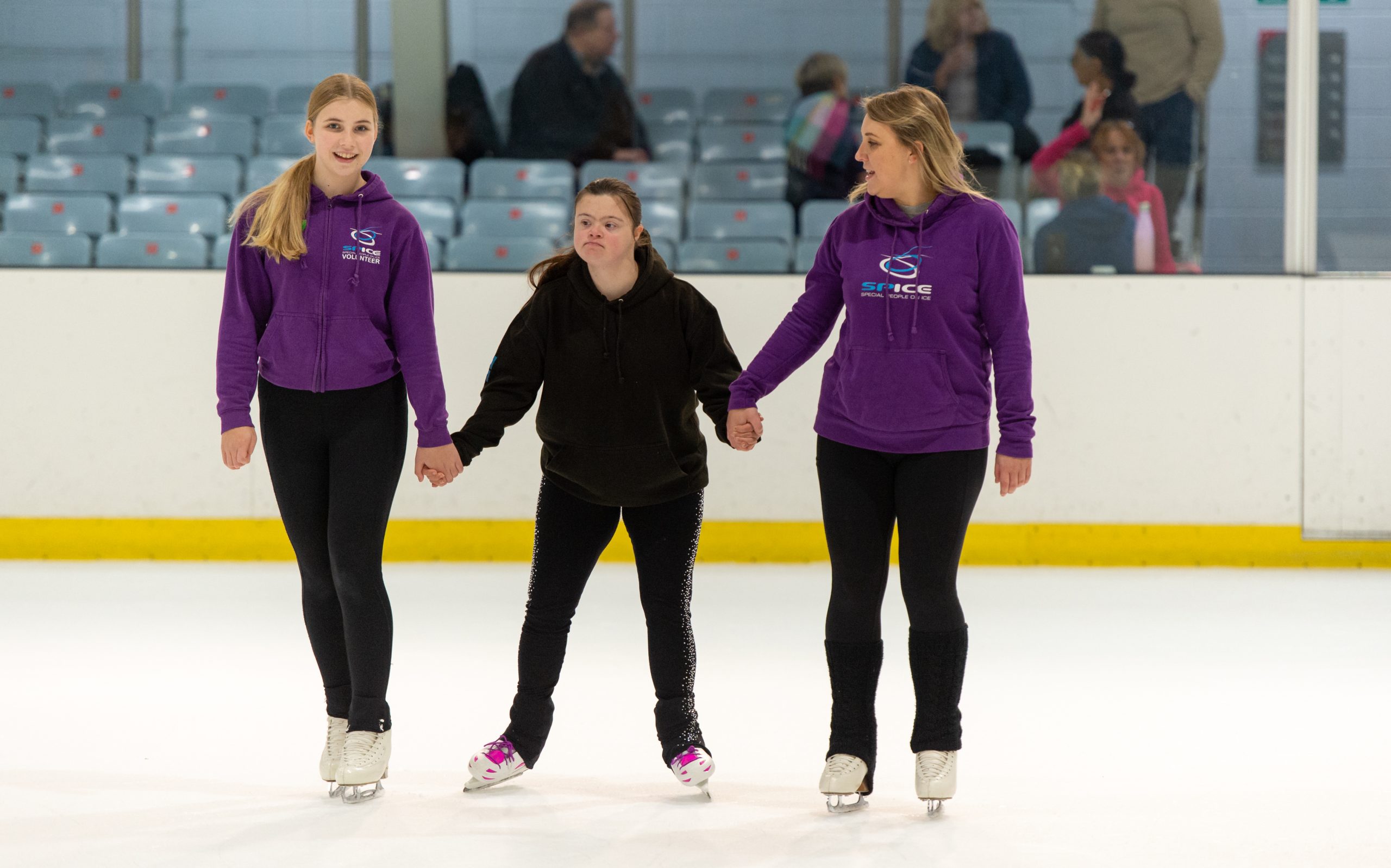 A disabled teenage girl iceskating