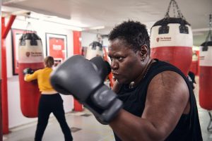 A black woman in a boxing gym