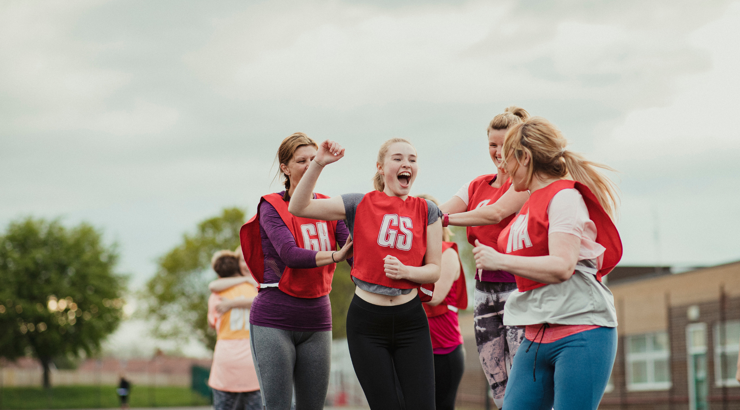 Young women playing netball