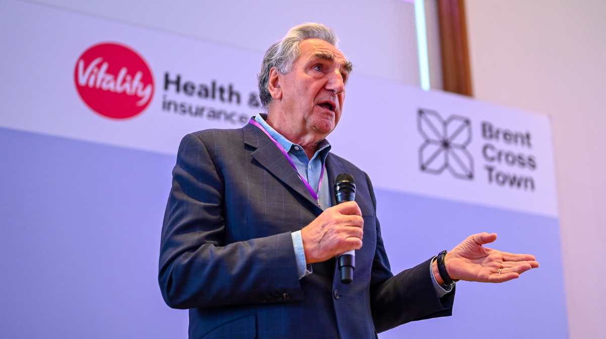 Downton Abbey actor Jim Carter OBE speaking onstage at the Women in Sport 2024 conference